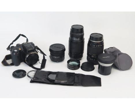 Collection of Camera Lenses including Sigma Auto Focus APO  75-300mm, Tamron AF 70-300mm, Sigma 18mm, Sonia 58mm x4, FinePix 