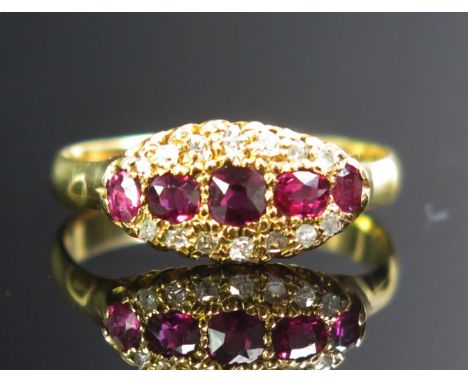 An 18ct Gold, Ruby and Diamond Ring, c. 3.3mm principal stone with old cut diamonds, stamped 18CT, size Q.5, 3.08g, early 20t