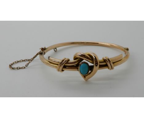 A 9ct gold turquoise set heart bangle, inner dimensions 5.7cm x 4.7cm, weight 9.9gms Condition Report: Available upon request