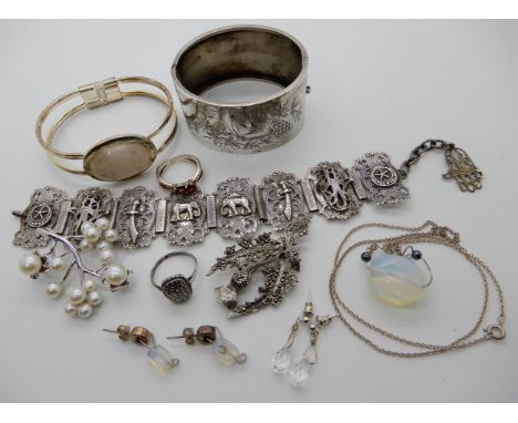 A wide bird engraved white metal bangle, silver and pearl pendant brooch and other items Condition Report: Not available for 