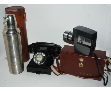 A Thermos flask in leather case, vintage telephone and Revere camera in case (3) Condition Report: Available upon request