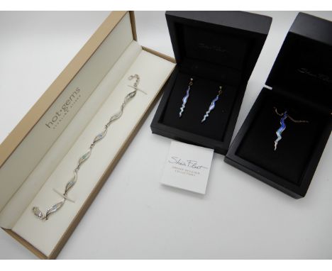 A silver and enamel Sheila Fleet pendant with matching earrings and a silver gem set bracelet Condition Report: Not available