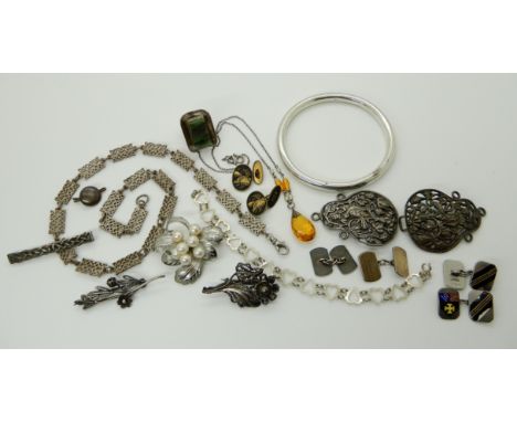 A silver bangle, silver knotwork chain, silver and pearl brooch and other items Condition Report: Not available for this lot