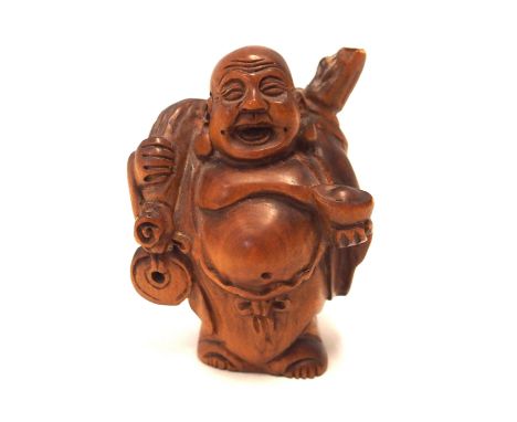 A Chinese netsuke of a laughing Buddha Condition Report: Available upon request