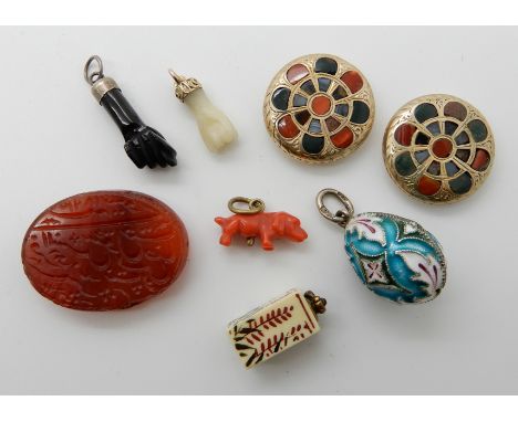 Two yellow metal Scottish agate inlaid rondels, (probably hat pin finials) a Russian silver and enamel egg pendant, a coral d