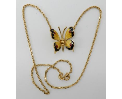 An 18ct gold Italian made enamel butterfly necklace, butterfly approx 2cm x 2.2cm, weight 10.1gms Condition Report: All in go
