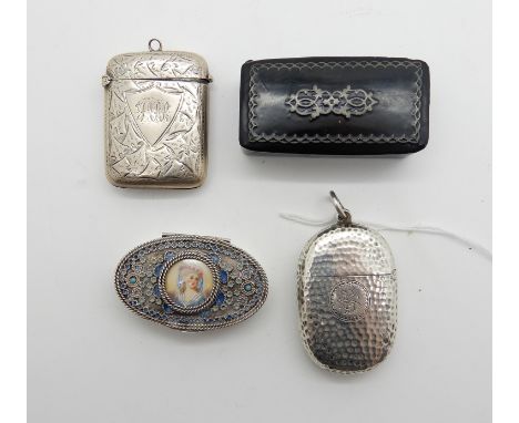 A lot comprising two silver vestas, a French white metal pictorial compact and a paper mache snuff box (4) Condition Report: 