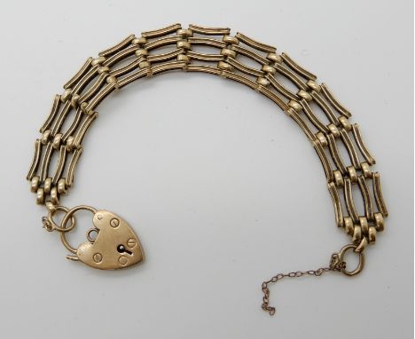 A 9ct gold gate bracelet with heart shaped clasp, length 19cm, weight 18.7gms Condition Report: Available upon request