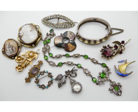 A continental silver and paste set necklace, a silver Avia brooch watch, a silver and enamel Norwegian Viking longship brooch