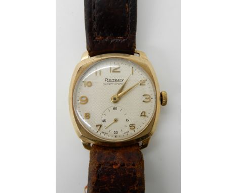 A 9ct gold gents vintage Rotary Super Sports watch head on brown leather strap Condition Report: Available upon request