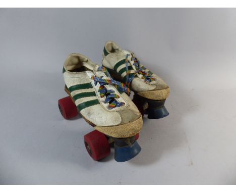 A Pair of Vintage Adidas Roller Skates 