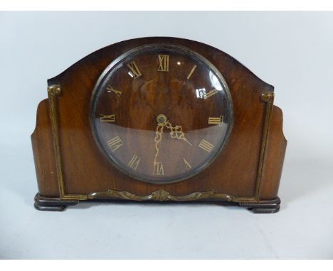 A Mid 20th Century Walnut Mantle Clock with Electric Movement 