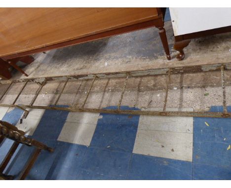 A Vintage Eleven Step Fire Escape Ladder in Metal
