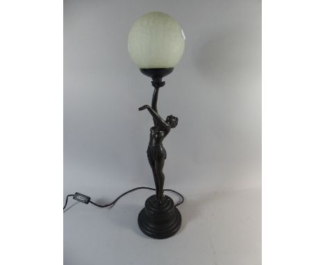 An Art Deco Style Figural Table Lamp in the Form of Topless Girl Supporting Globe, 65cm high