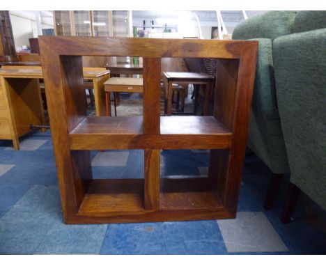 An Indonesian Hardwood Four Section Shelf Unit, 94cm WIde