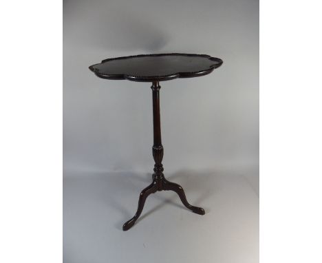 A 19th Century High Crust Moulded Shaped Toped Tripod Wine Table (Some Losses)  