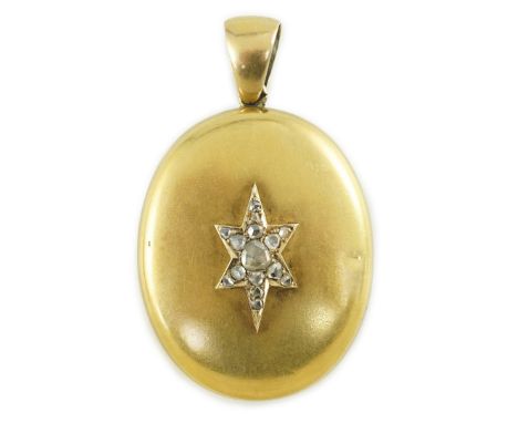 A Victorian gold and rose cut diamond set oval pendant locket, the front panel with central star motif, overall 61mm, gross w