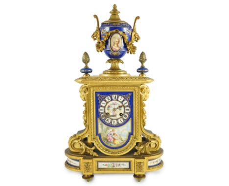 A 19th century French ormolu and Sevres style porcelain mantel clock, with architectural urn surmounted case, porcelain plaqu