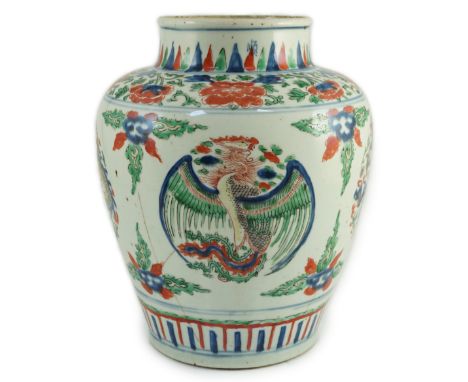 A Chinese Transitional wucai ‘dragon and phoenix roundel’ vase, 17th century, the roundels between foliate sprigs, flower and