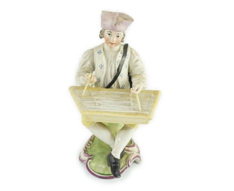 A Frankenthal porcelain figure of a zither player, c.1760, modelled seated on a scrollwork base, underglaze blue lion, monogr