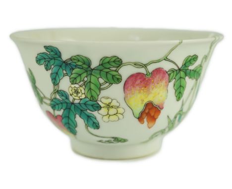 A Chinese famille rose bowl, Jiaqing seal mark and of the period (1796-1820), painted with fruiting vines, bamboo and butterf
