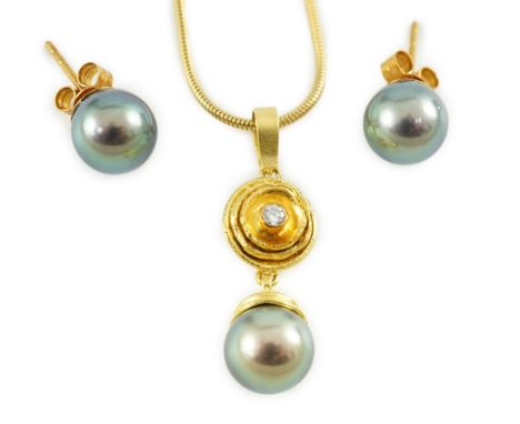 A modern textured gold, diamond and Tahitian pearl set drop pendant, on an 18ct gold snake link chain, in Asprey &amp; Garrar