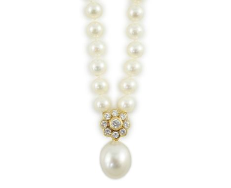 A late 1990's single strand cultured pearl and diamond cluster set necklace, with 18ct gold clasp and nine stone diamond clus