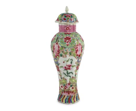 A Chinese famille rose moulded baluster vase, Qianlong period, painted with trailing flowers on a cellular ground, the domed 