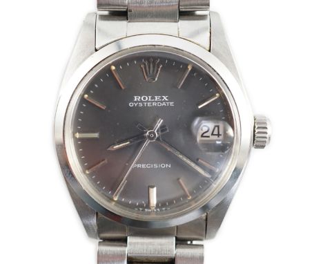 A 1980's mid-size stainless steel Rolex Oysterdate Precision manual wind wrist watch, on a stainless steel Rolex bracelet, wi