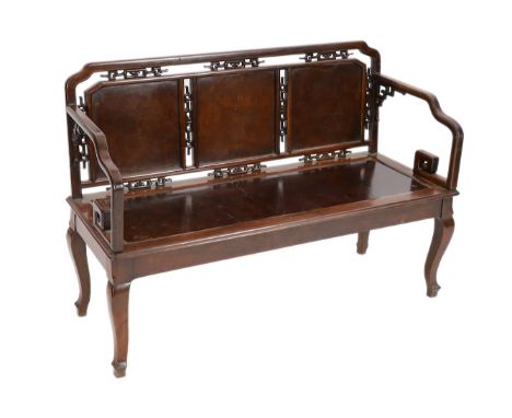 A Chinese huanghuali and burr wood bench seat, with triple panel back interspersed with stylised cloud motifs and solid seat 