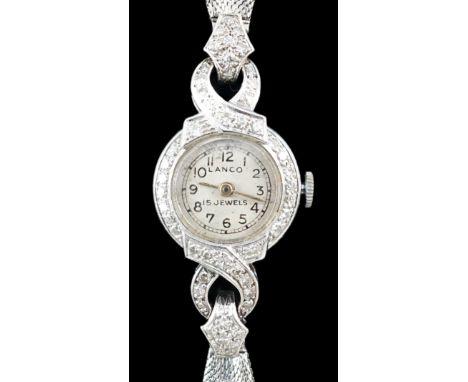 A lady's platinum and diamond set Lanco manual wind cocktail watch, on a 9ct gold and six stone diamond set bracelet, with Ar