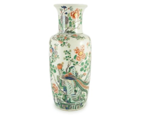 A Chinese famille verte vase baluster vase, late 19th century, painted with a phoenix amid rockwork, blossoming trees and flo