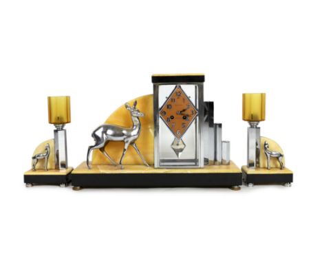 A French Art Deco chrome and marble clock garniture, by H. Loiseau of Chateauroux, the central clock of four glass constructi