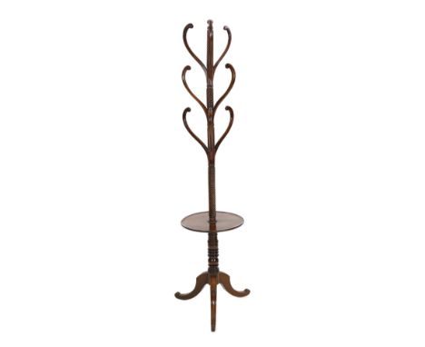 A Regency mahogany hat stand, with central spiral twist column and nine scrolling arms over circular understage and downswept