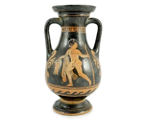 An Apulian red figure Pelike, 4th century BCE., painted with the portrait of a woman, the reverse with a nude man carrying a 