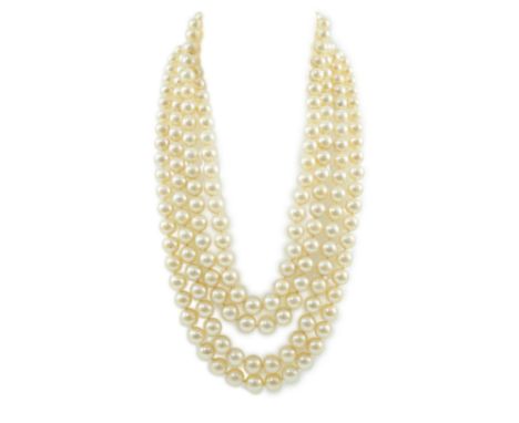 A mid to late 20th century continental quadruple strand cultured pearl necklace, with white gold and diamond cluster set flow