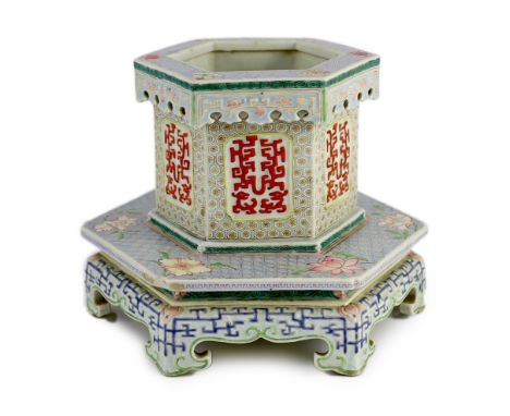 A Chinese enamelled porcelain hexagonal jardiniere, Qianlong period (1736-95), the upper section with archaistic scrollwork p