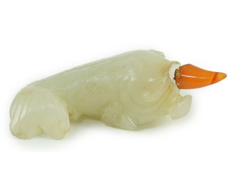 A Chinese pale celadon jade 'fish' snuff bottle, 19th century, probably converted from an earlier carving of a fish grasping 