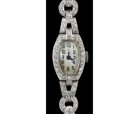A lady's 1920’s platinum and round brilliant cut diamond set manual wind cocktail watch, on a white gold expanding bracelet, 