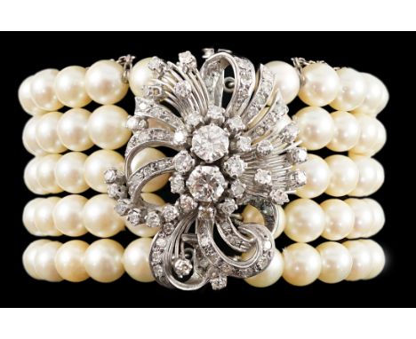 A mid to late 20th century continental quintuple strand cultured pearl bracelet, with white gold and diamond cluster set scro