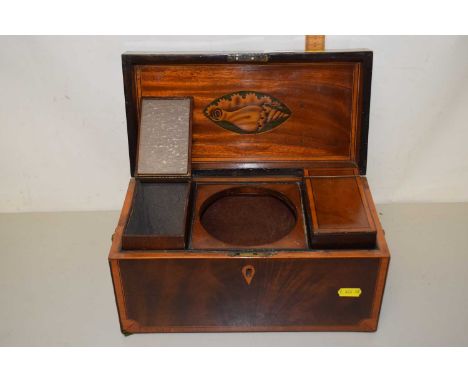 A mahogany and brass inlaid tea caddy