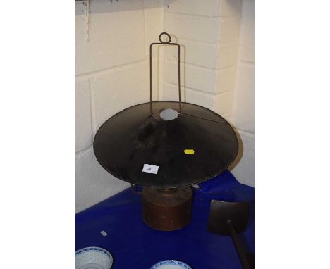 A hanging oil lamp