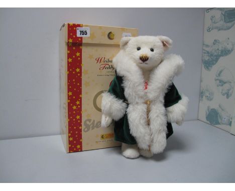 A Modern Steiff Jointed Teddy Bear #37504, Christmas Musical Teddy Bear,  Limited Edition 906 of 2006, 30cm high, tags attach