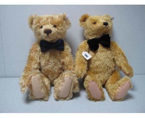 Two Modern Teddy Bears by Steiff, both jointed and approximately 19" high with original ear studs and tags, one with blue str