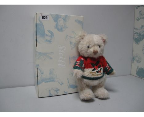 A Modern Steiff Jointed Christmas Teddy Bear #036002, Limited Edition, No. 1291 of 2009, 25cm high, tags attached, certified,