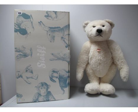 A Modern Steiff Jointed Polar Bear #036514, 65cm high, tags attached. Boxed