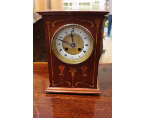 A MAHOGANY CASED MANTEL CLOCK with Art Nouveau inlaid case 