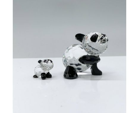 Two pandas, a poised mother panda with one paw raised, exuding warmth, while her curious baby looks up in awe. Swarovski back