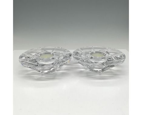 Cut crystal in checkerboard pattern on reverse with clear smooth crystal top and center holder for tealight. Orrefors mark. T