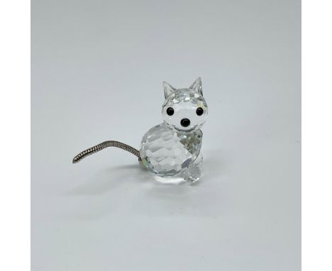 Clear faceted crystal figure of a seated cat with black nose and eyes, flexible metal tail. This item has its original box wh